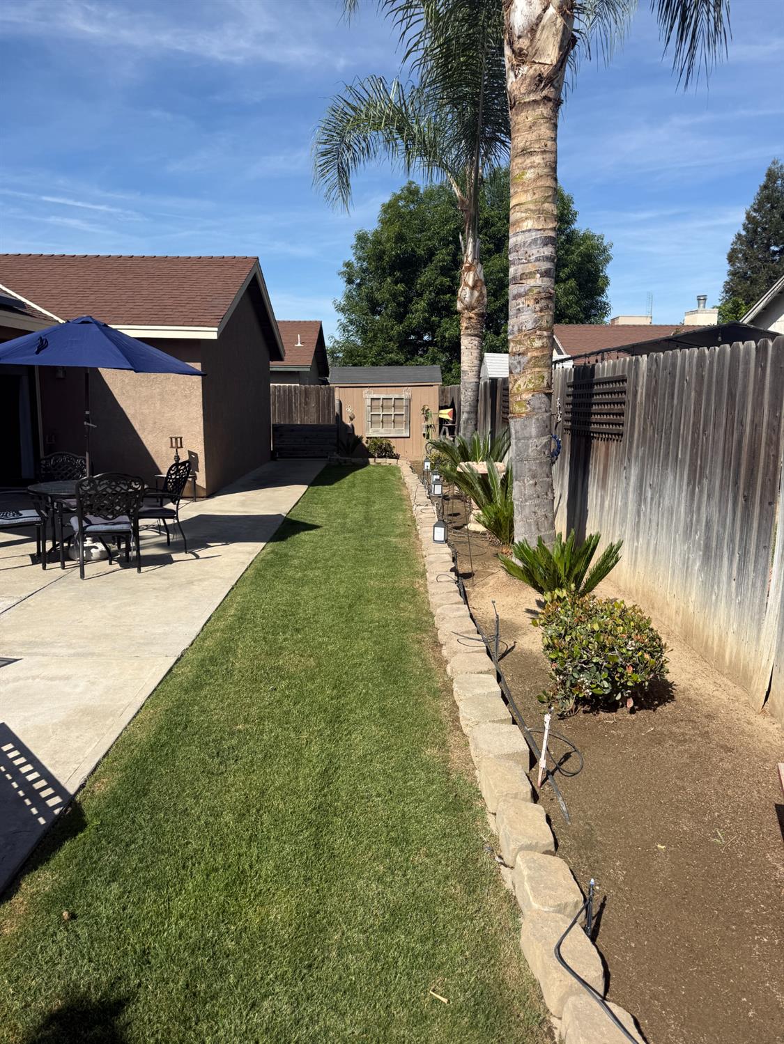 14312 West B Street Kerman, CA 93630 - Photo 20 of 24 a view of outdoor space and yard