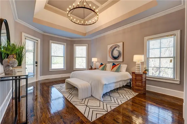 a spacious bathroom with a granite countertop sink mirror and a
