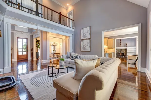 a living room with furniture and a table