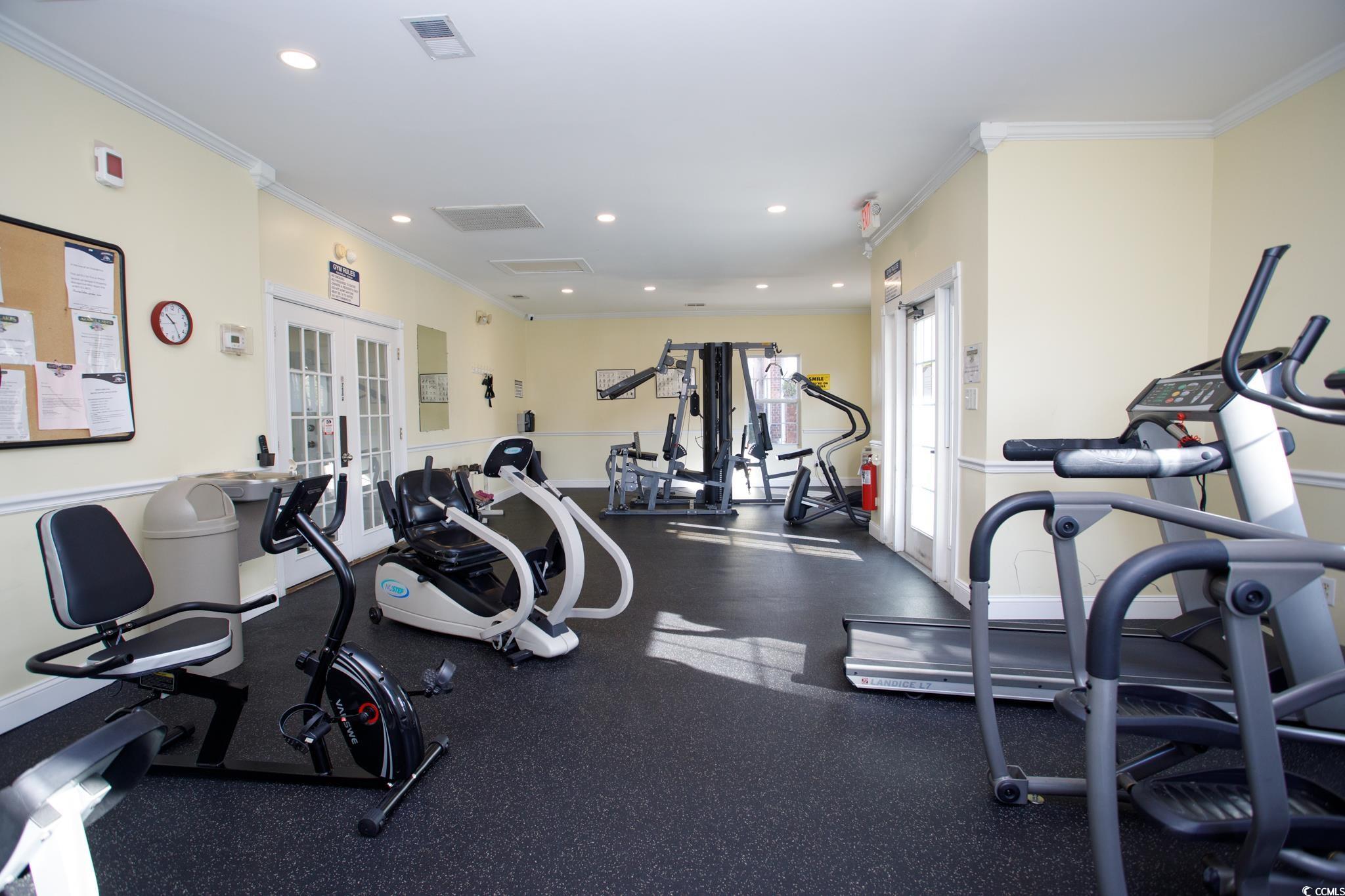 3979 Forsythia Court, Unit 204 Myrtle Beach, SC 29588 - Photo 12 of 29 Gym with ornamental molding, recessed lighting, and french doors