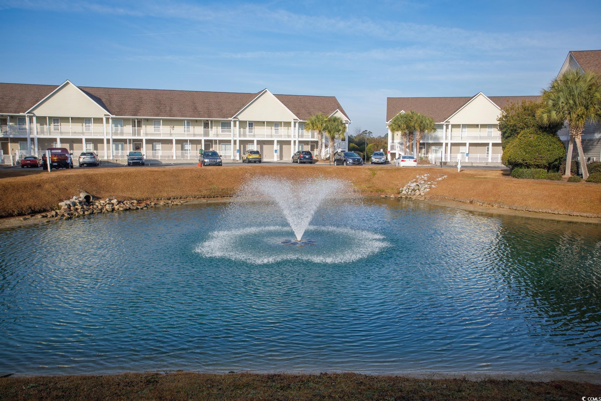 3979 Forsythia Court, Unit 204 Myrtle Beach, SC 29588 - Photo 23 of 29 Water view with nearby suburban area