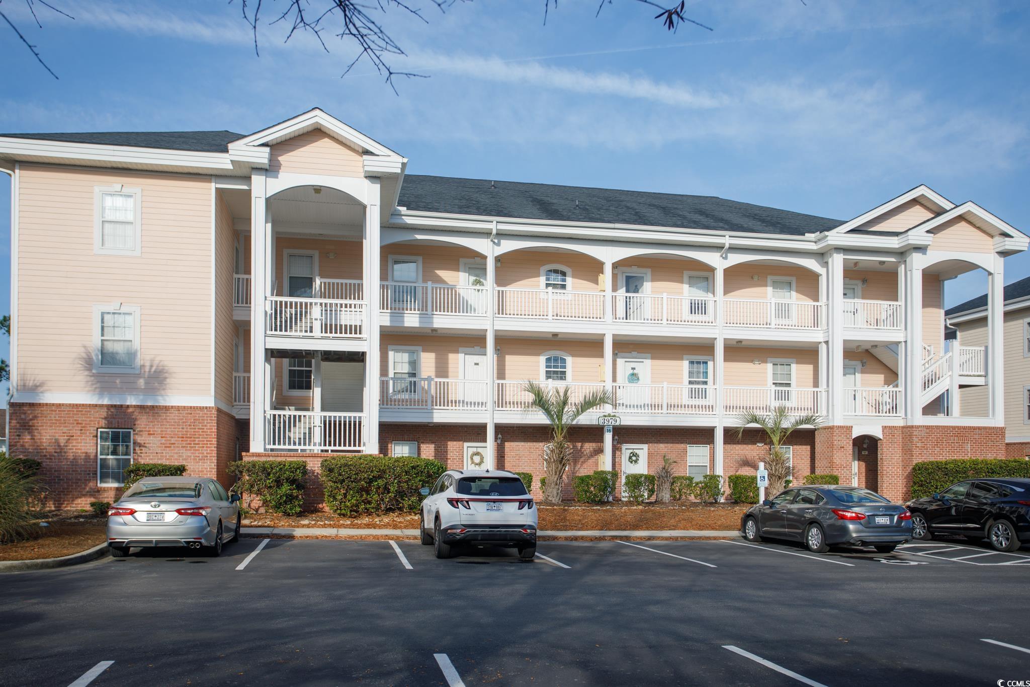 3979 Forsythia Court, Unit 204 Myrtle Beach, SC 29588 - Photo 3 of 29 View of apartment building / complex with uncovered parking