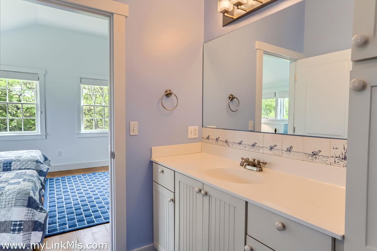 370 Lighthouse Road Aquinnah, MA 02535 - Photo 30 of 56 shared bath looking towards guest bedroom on main floor