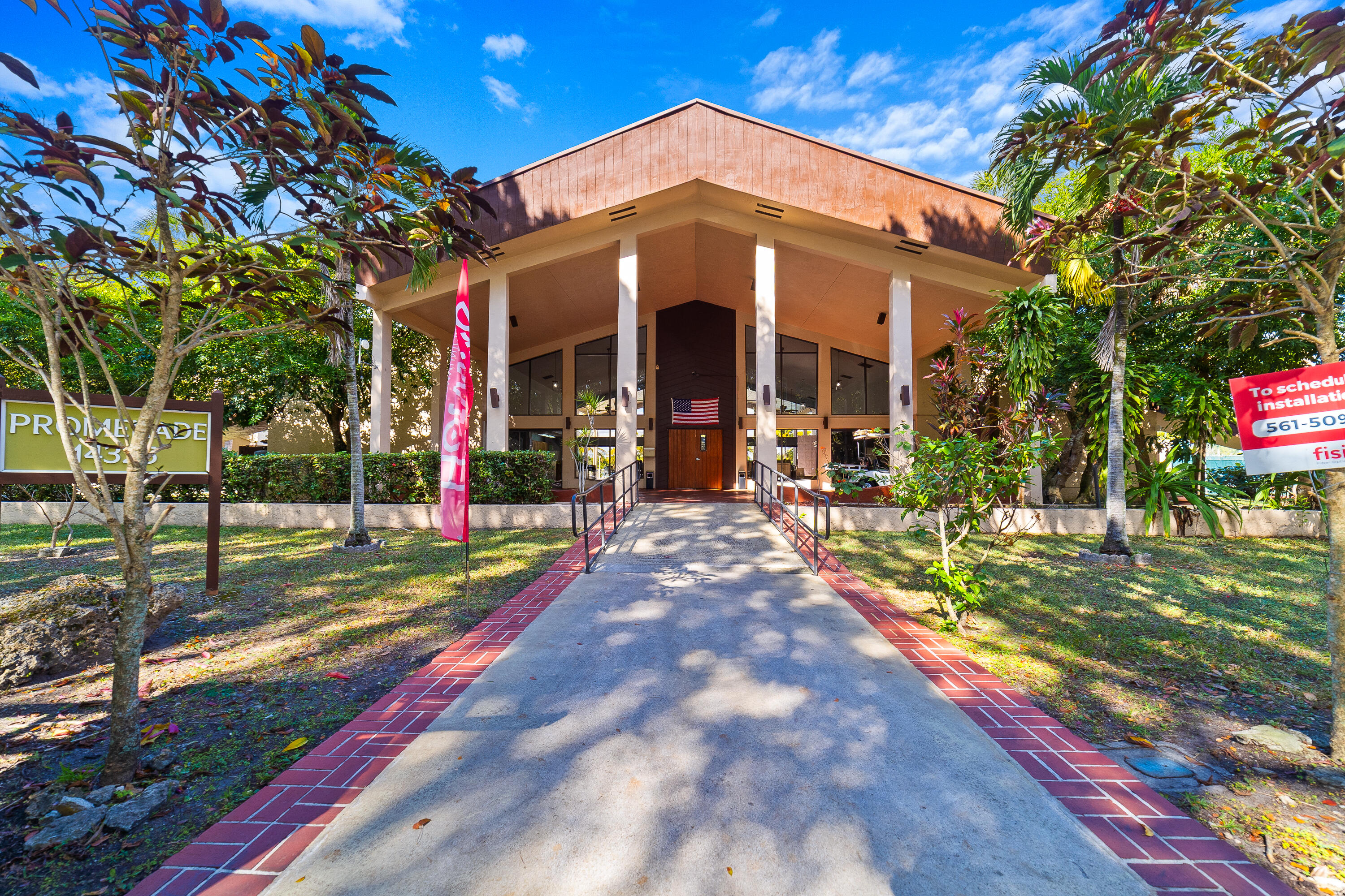 14221 Southwest 88th Street, Unit 303C Miami, FL 33186 - Photo 19 of 29 a front view of a house with a yard