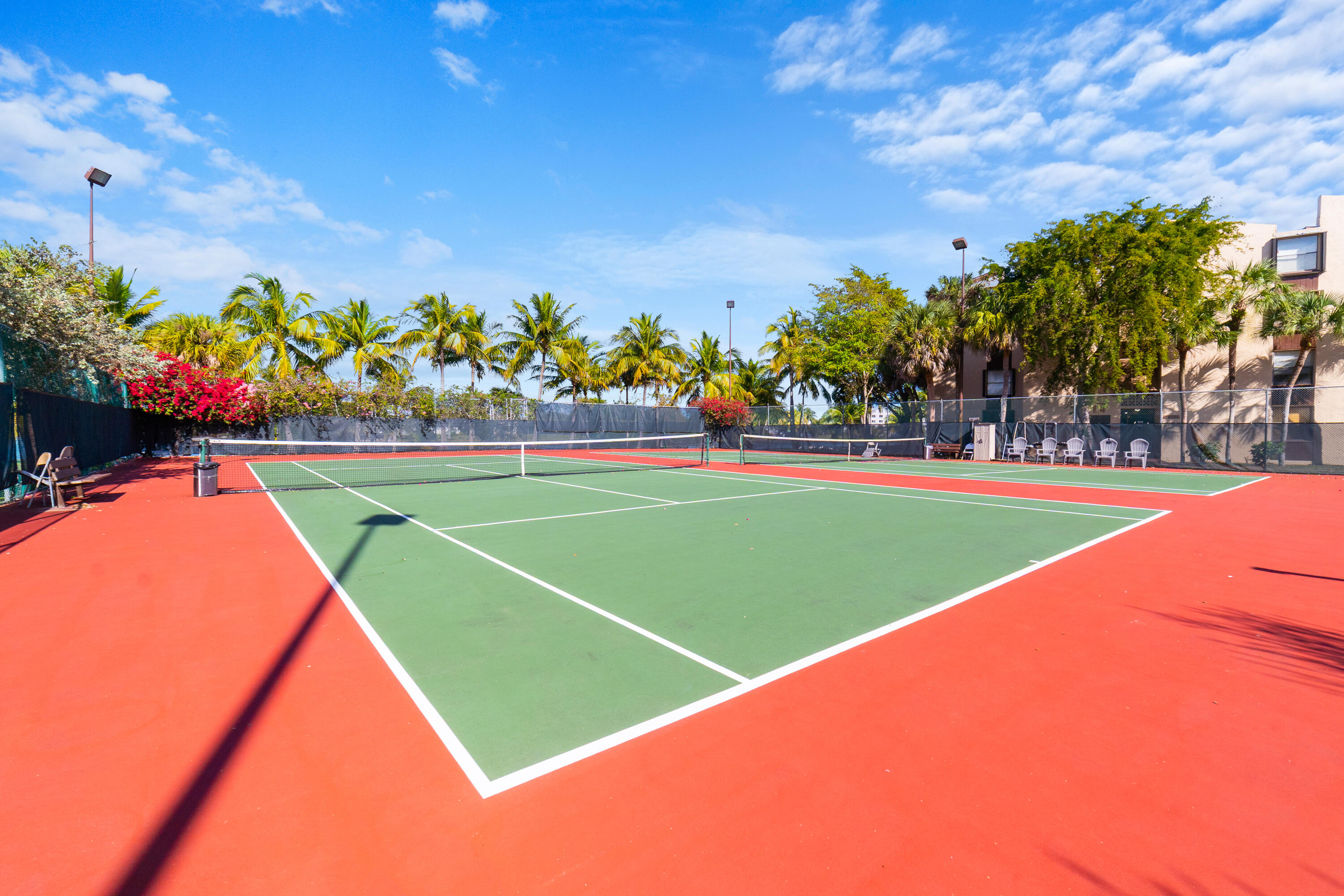 14221 Southwest 88th Street, Unit 303C Miami, FL 33186 - Photo 24 of 29 a view of a tennis court