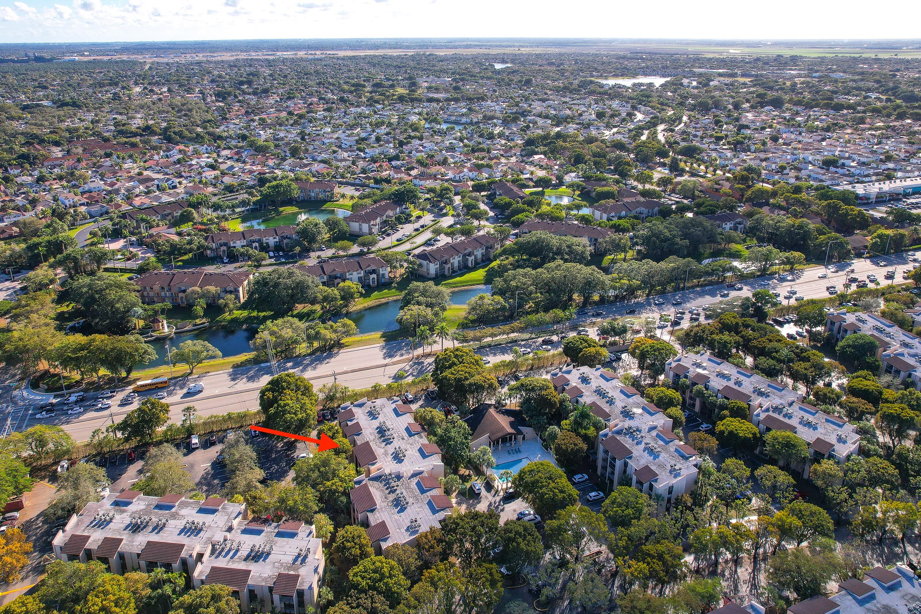 14221 Southwest 88th Street, Unit 303C Miami, FL 33186 - Photo 29 of 29 an aerial view of multiple house