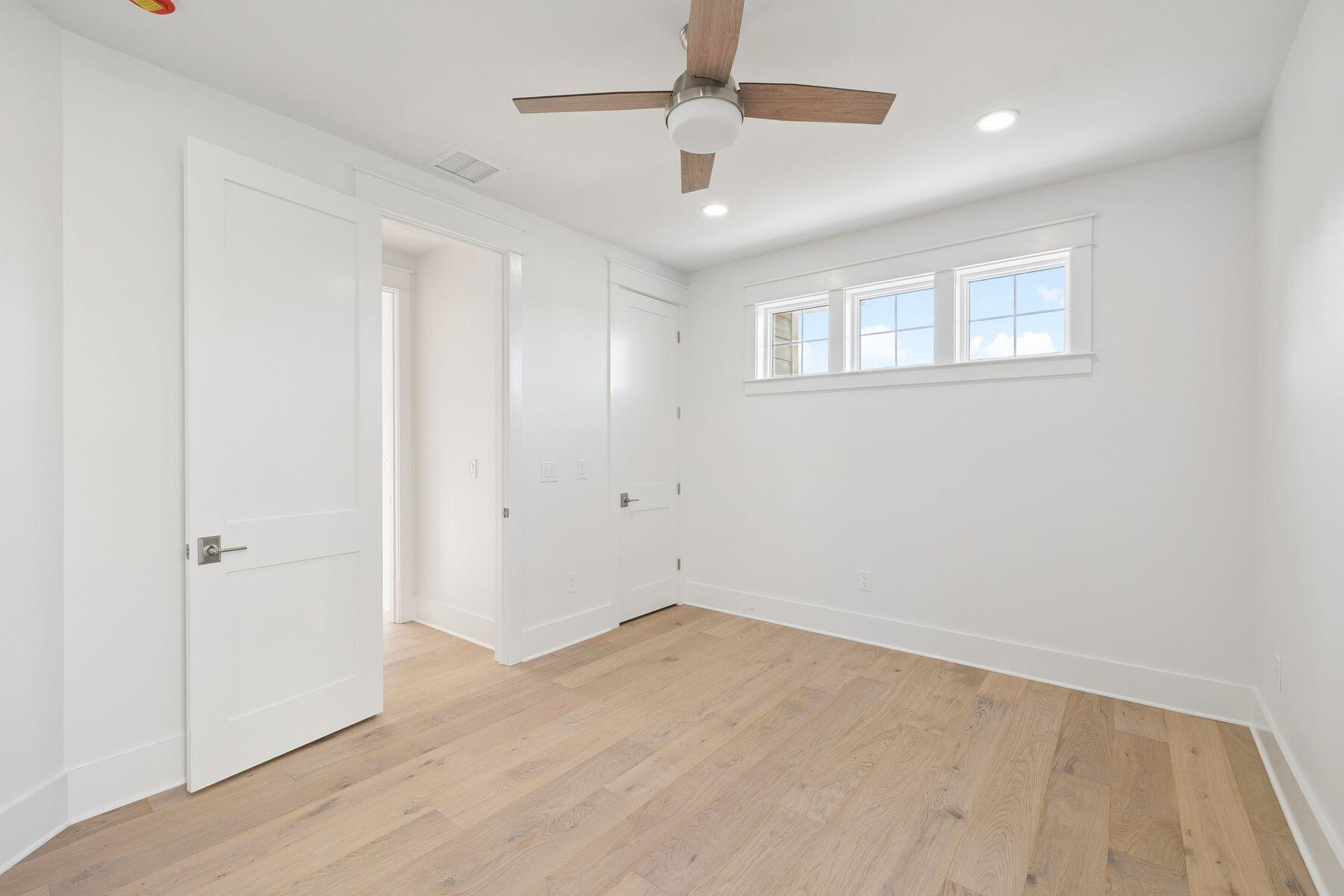 1885 West Hewett Road Santa Rosa Beach, FL 32459 - Photo 25 of 35 wooden floor in an empty room