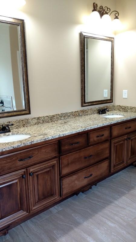 357 Eagle Ridge Road Macon, GA 31216 - Photo 14 of 33 a bathroom with a sink and a mirror