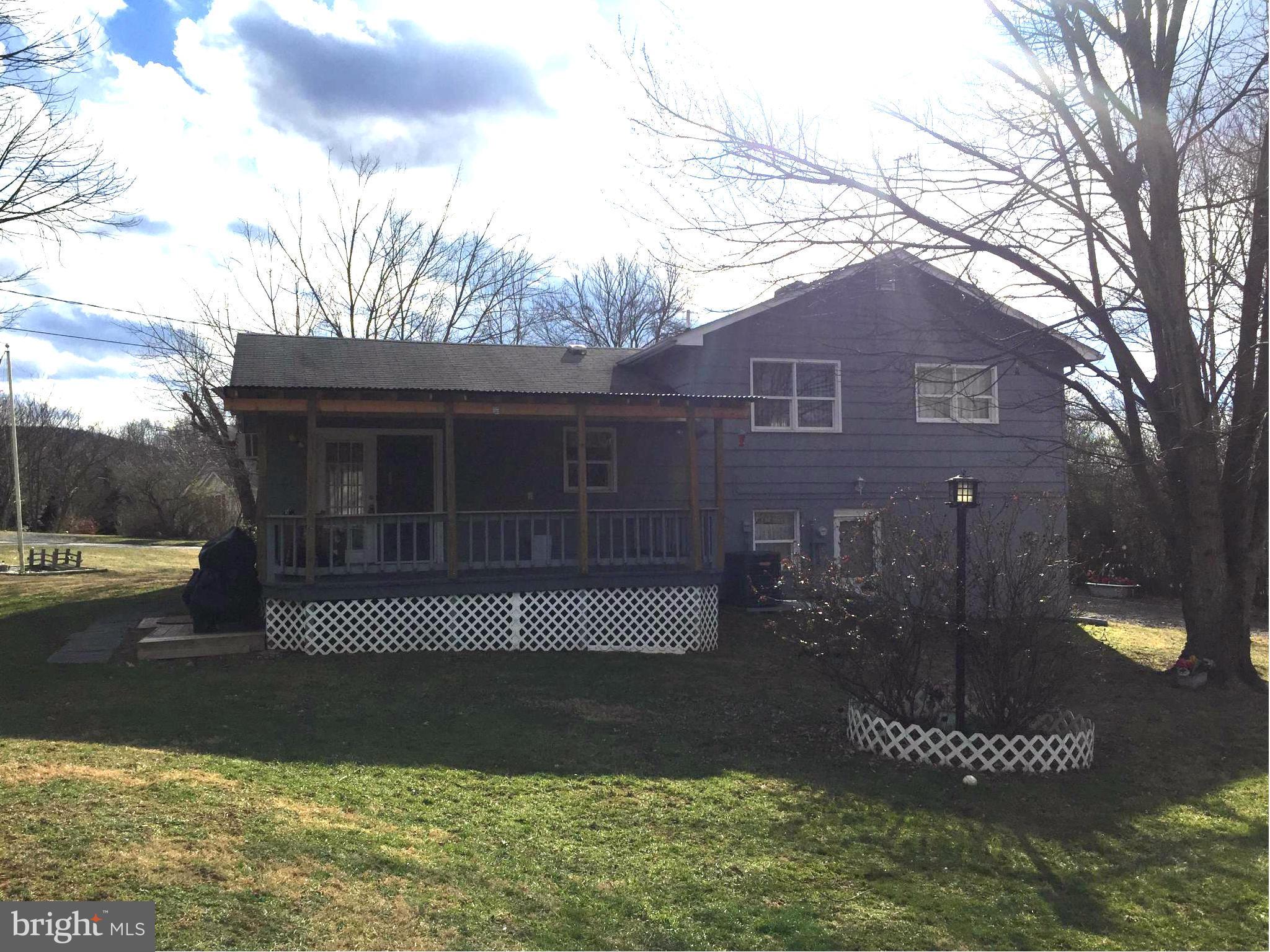 158 Farm View Road Front Royal, VA 22630 - Photo 2 of 10 a front view of a house with a yard