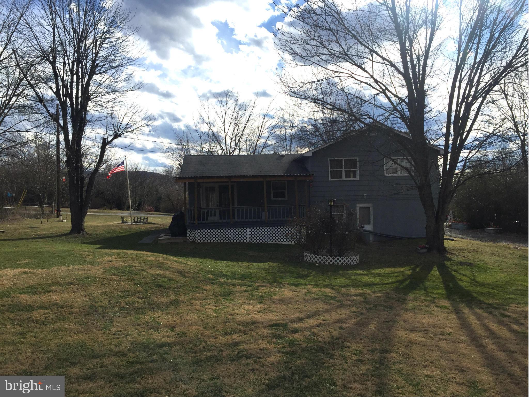 158 Farm View Road Front Royal, VA 22630 - Photo 6 of 10 a view of a house with a yard