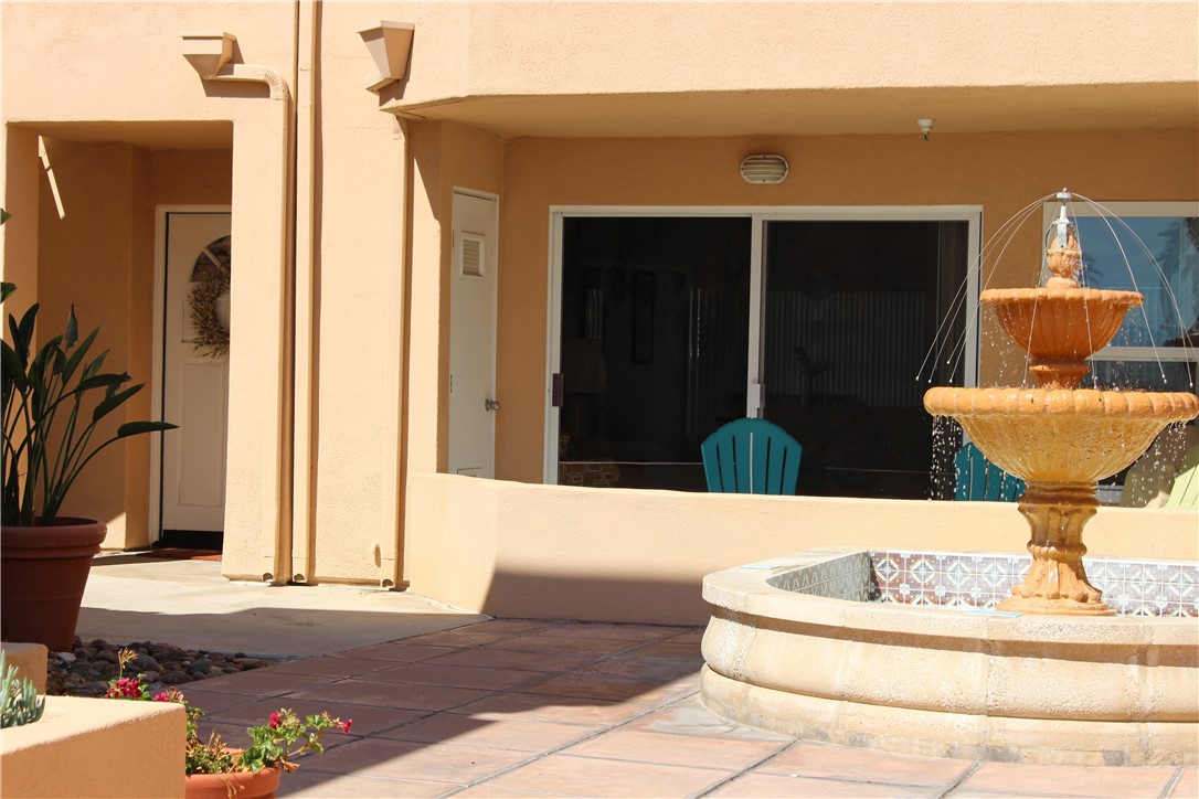 501 North Pacific Street, Unit 23 Oceanside, CA 92054 - Photo 17 of 24 a living room with furniture and a potted plant
