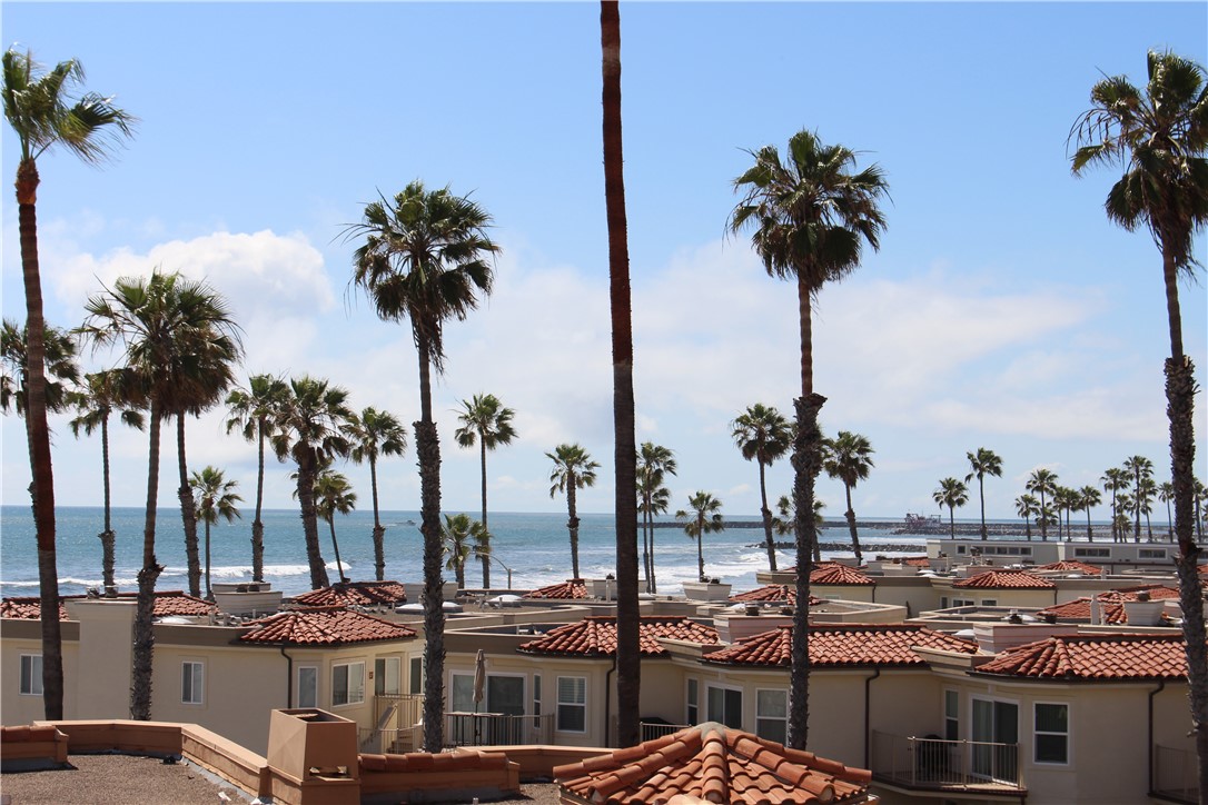 501 North Pacific Street, Unit 23 Oceanside, CA 92054 - Photo 18 of 24 an ocean view with palm trees