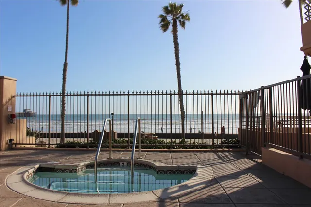 a view of parking garage with cars