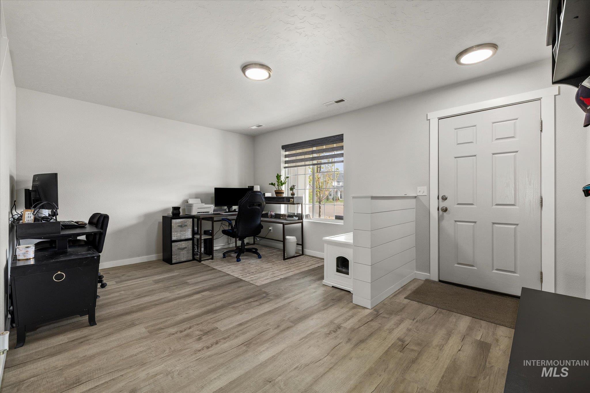 2024 Placerville Street Middleton, ID 83644 - Photo 11 of 38 Office space with light wood-style floors and baseboards