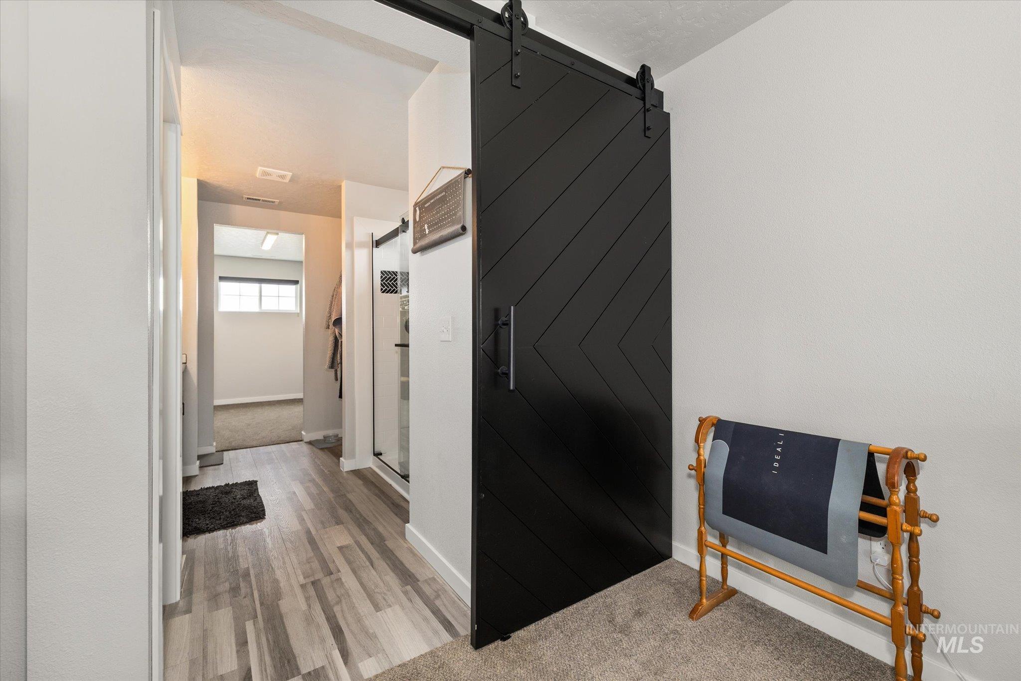 2024 Placerville Street Middleton, ID 83644 - Photo 20 of 38 Bathroom with a shower stall and light wood finished floors