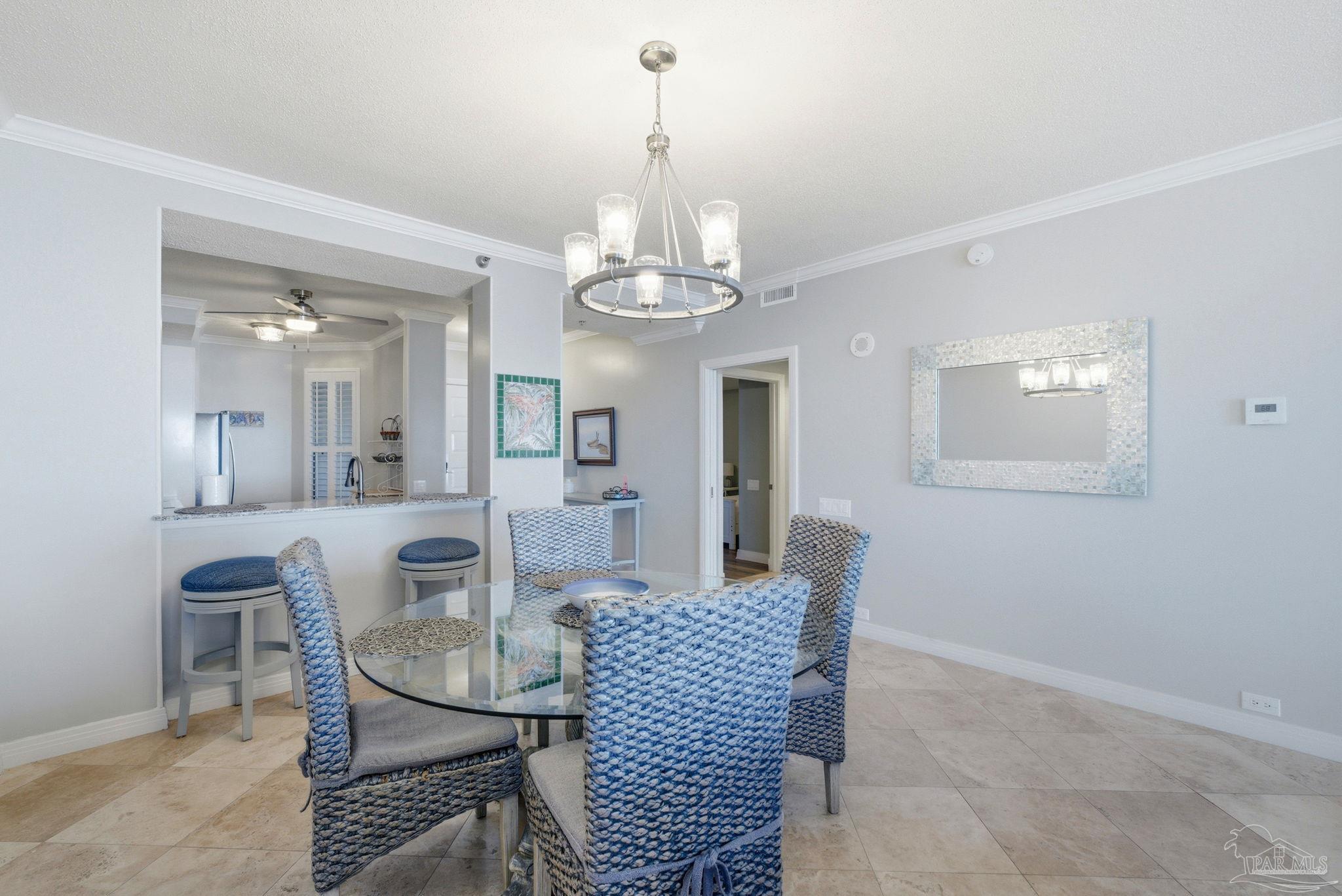 13601 Perdido Key Drive, Unit W2C Perdido Key, FL 32507 - Photo 8 of 63 a dining room with furniture and window