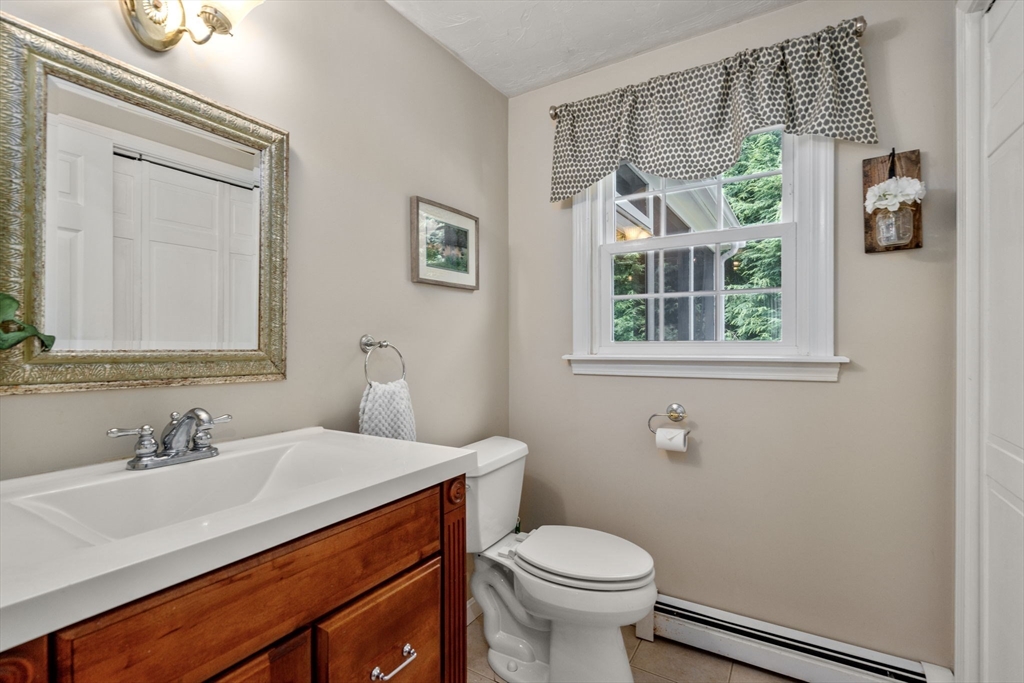 16 Jasmine Road Medway, MA 02053 - Photo 19 of 41 a bathroom with a sink and a mirror