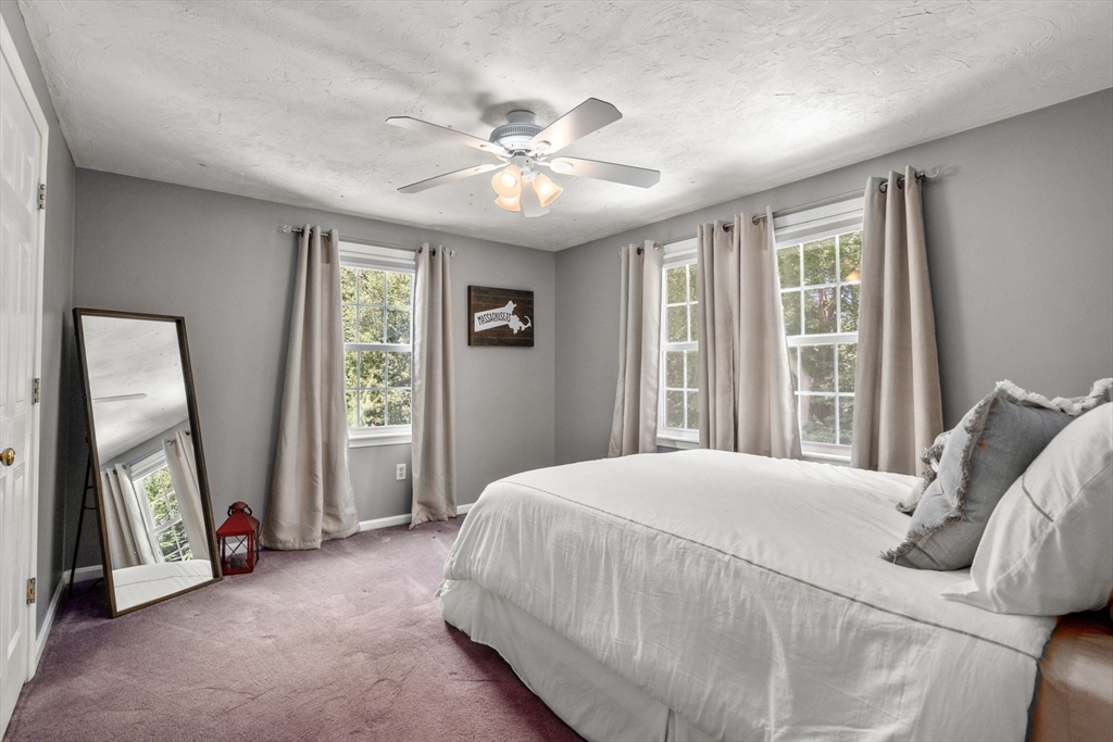 16 Jasmine Road Medway, MA 02053 - Photo 26 of 41 a bedroom with a bed and a large window