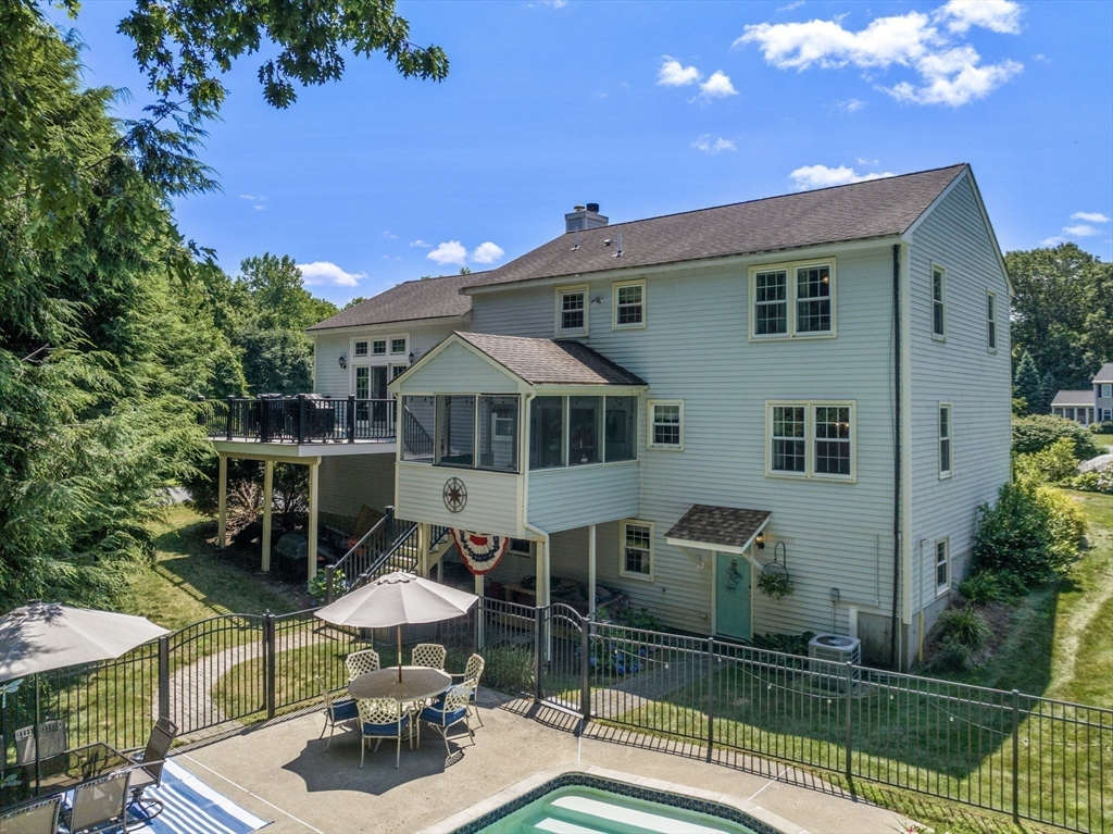 16 Jasmine Road Medway, MA 02053 - Photo 33 of 41 a front view of a house with sitting area