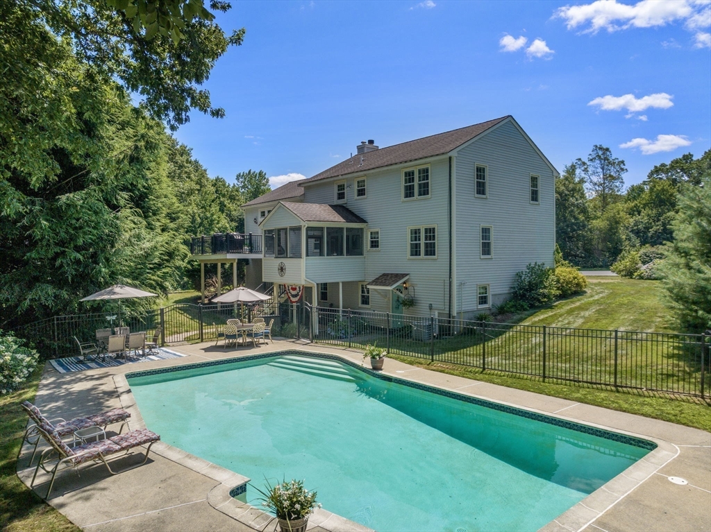 16 Jasmine Road Medway, MA 02053 - Photo 34 of 41 a view of a house with backyard and sitting area
