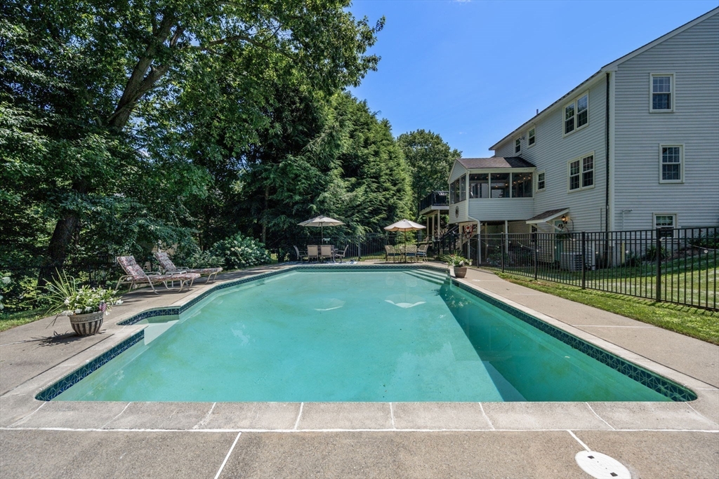 16 Jasmine Road Medway, MA 02053 - Photo 35 of 41 a view of a swimming pool with a patio