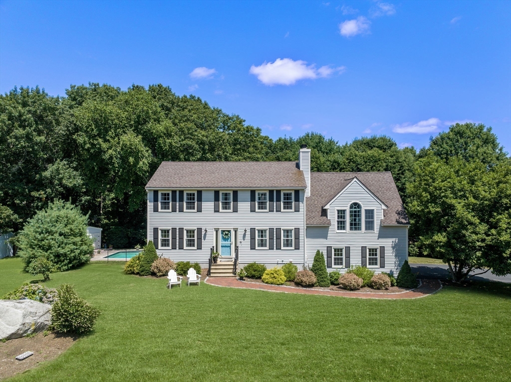 16 Jasmine Road Medway, MA 02053 - Photo 38 of 41 a front view of a house with a garden