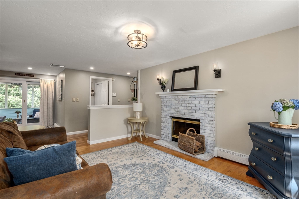 16 Jasmine Road Medway, MA 02053 - Photo 8 of 41 a living room with furniture and a fireplace