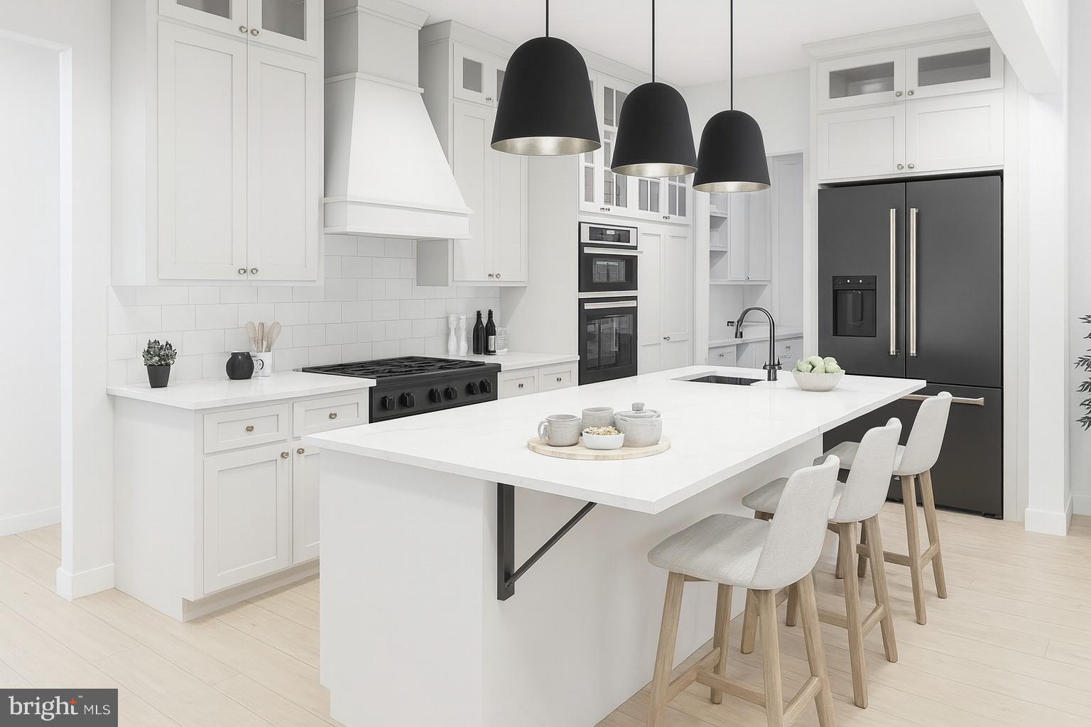 3130 Bidle Road Middletown, MD 21769 - Photo 11 of 16 a kitchen with stainless steel appliances kitchen island granite countertop a sink a refrigerator and cabinets