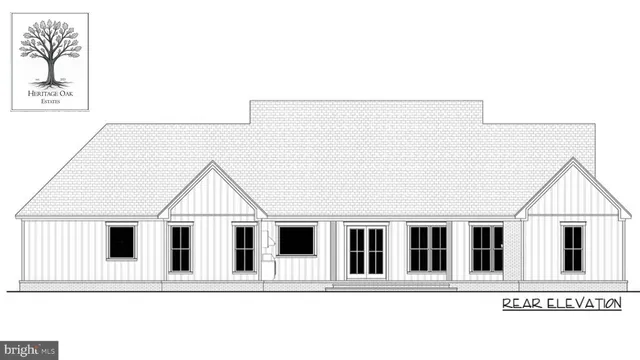 a white building with a white fence