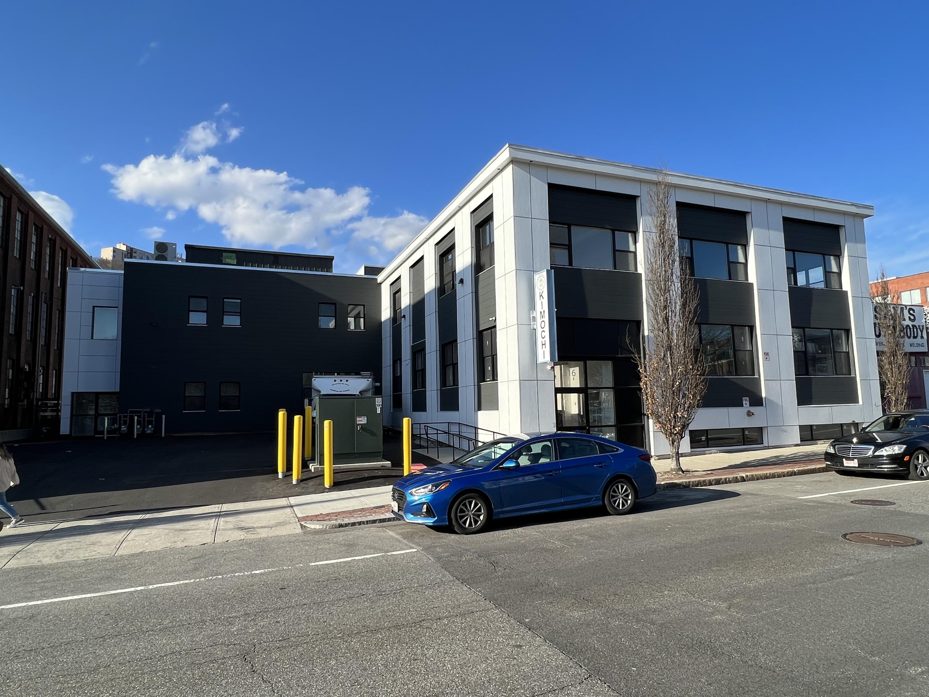 316 Shrewsbury Street Worcester, MA 01604 - Photo 5 of 8 a view of building with car parked