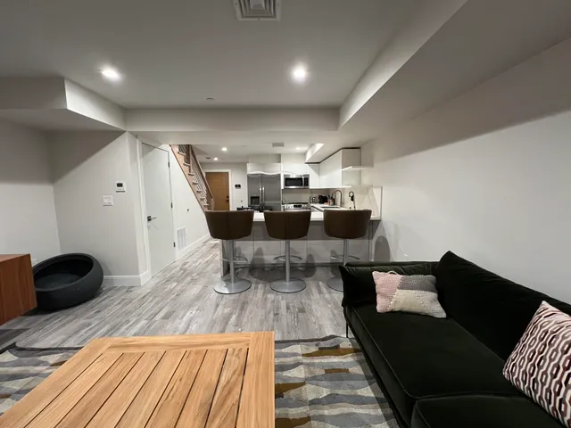 a bedroom with bed and window