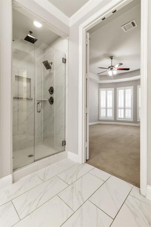 2936 Prescott The Colony, TX 75056 - Photo 14 of 28 a bathroom with a shower a sink and a mirror