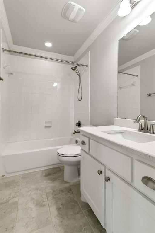 2936 Prescott The Colony, TX 75056 - Photo 17 of 28 a bathroom with a granite countertop sink a toilet and bathtub