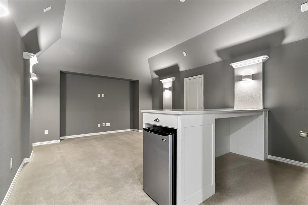 2936 Prescott The Colony, TX 75056 - Photo 19 of 28 wooden floor in a room with kitchen view