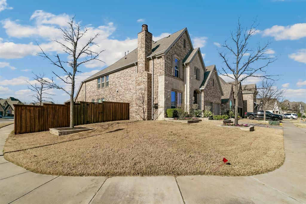 2936 Prescott The Colony, TX 75056 - Photo 2 of 28 a view of a house with snow on the road