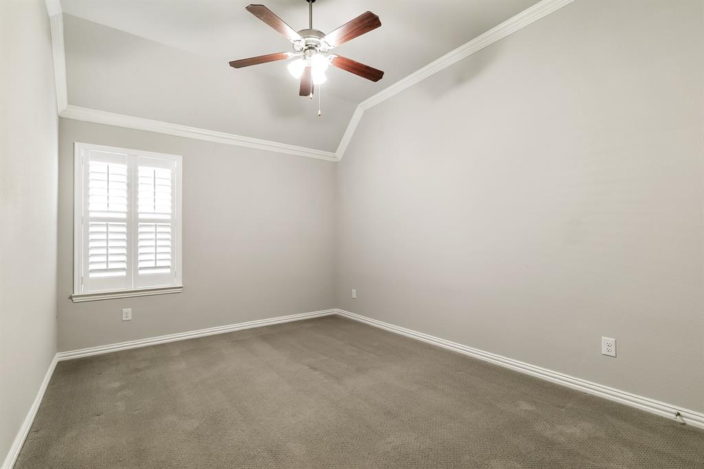 2936 Prescott The Colony, TX 75056 - Photo 22 of 28 an empty room with a window and a fan