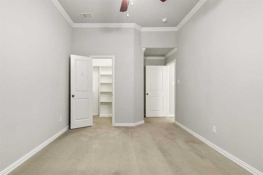 2936 Prescott The Colony, TX 75056 - Photo 24 of 28 an empty room with closet and a window