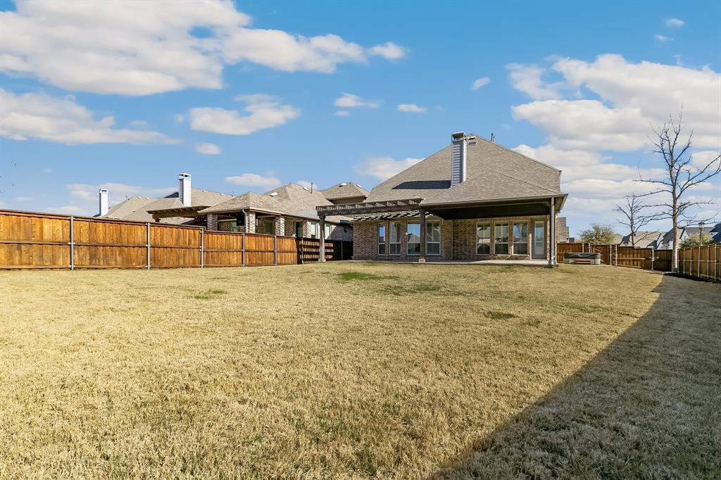 2936 Prescott The Colony, TX 75056 - Photo 28 of 28 a front view of a house with a yard