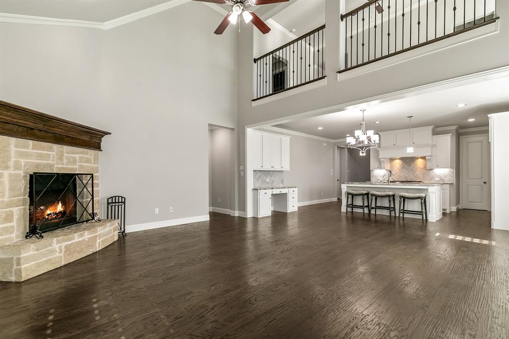 2936 Prescott The Colony, TX 75056 - Photo 7 of 28 a view of a livingroom with furniture and a fireplace