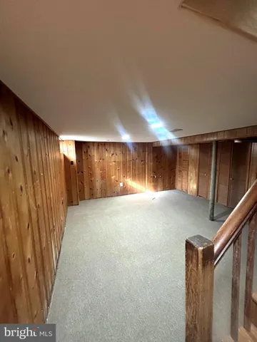 a view of a room with a refrigerator