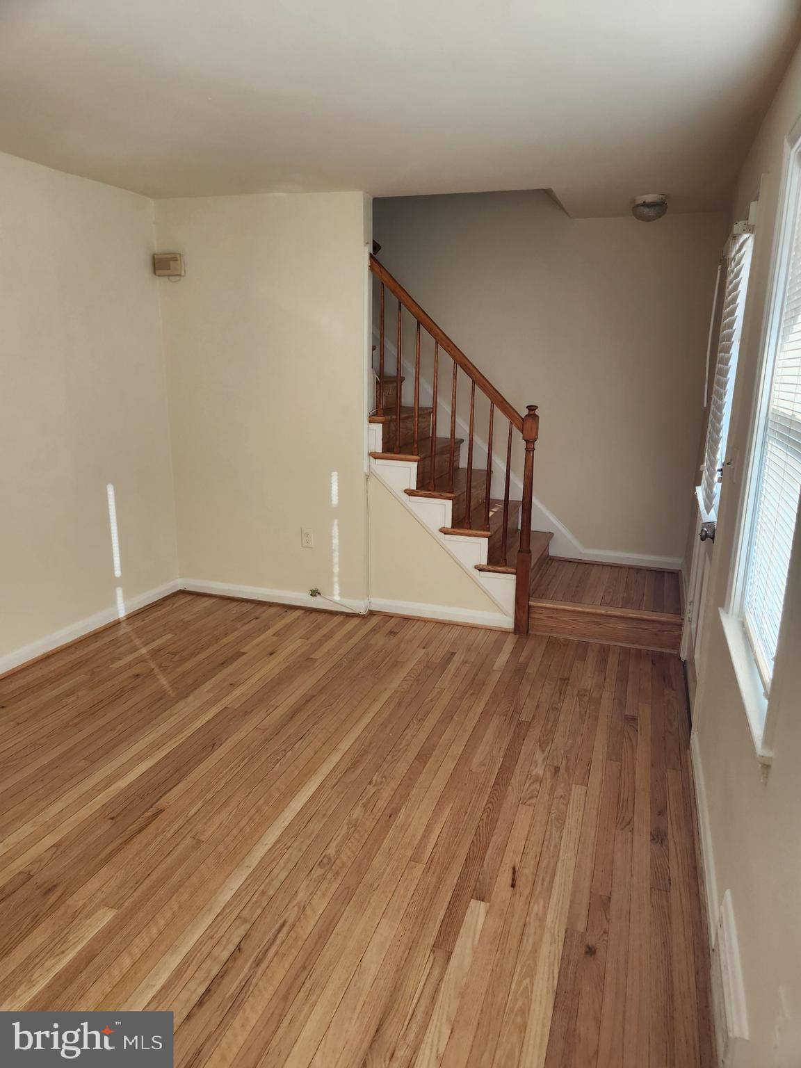 1330 Meridene Drive Baltimore, MD 21239 - Photo 2 of 15 a view of entryway with wooden floor