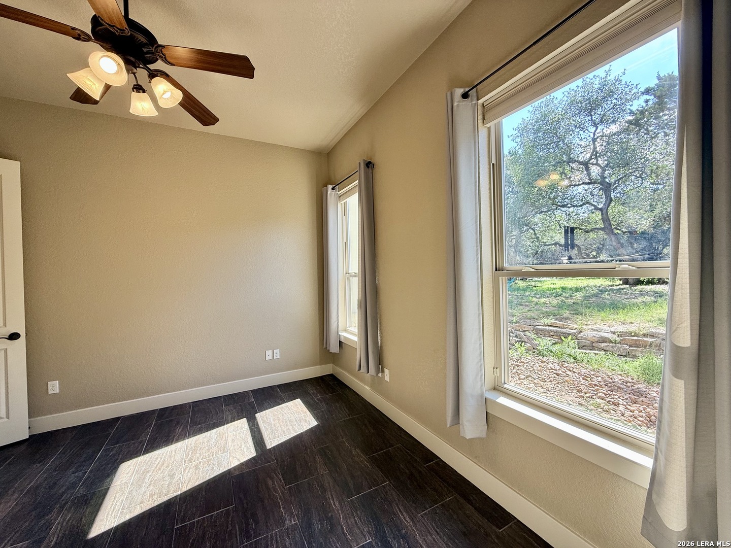 757 Copper Rim Spring Branch, TX 78070 - Photo 28 of 50 a view of empty room with wooden floor and fan