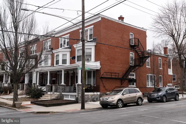 a car parked in front of a building