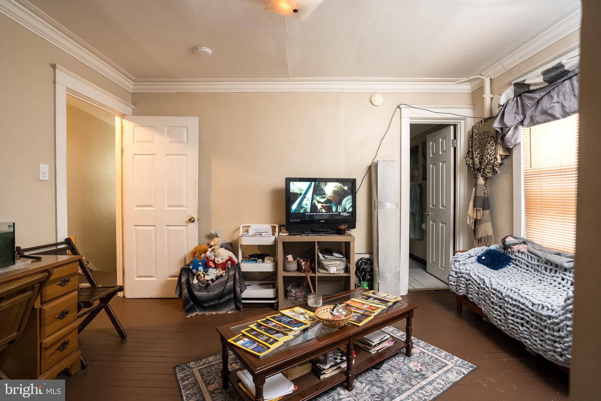 102 Ruby Street Lancaster, PA 17603 - Photo 29 of 41 a bedroom with furniture and a flat screen tv