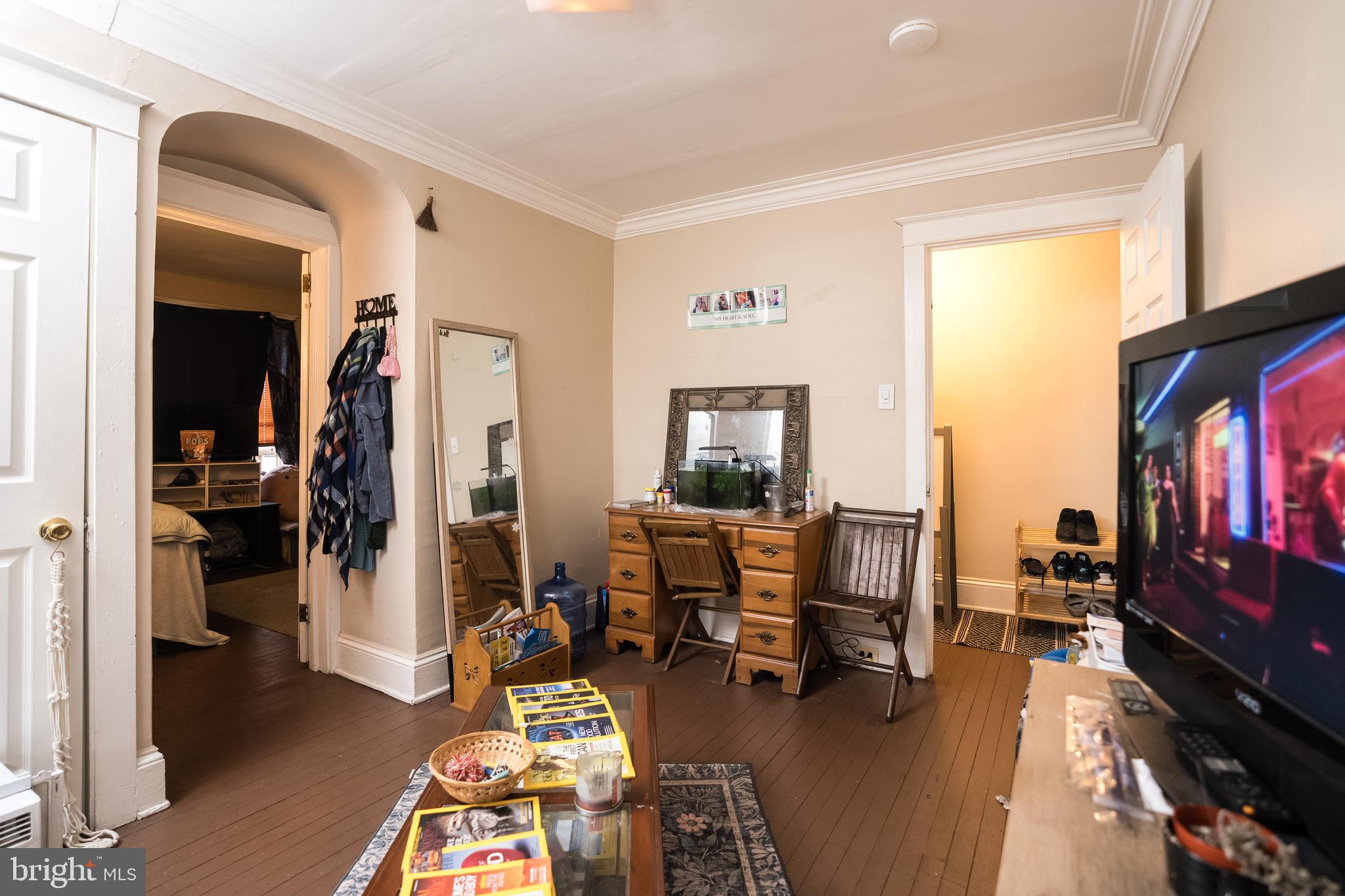 102 Ruby Street Lancaster, PA 17603 - Photo 32 of 41 a living room with furniture and a flat screen tv