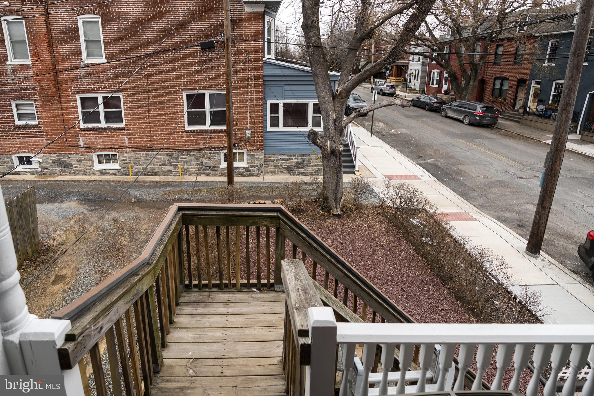 102 Ruby Street Lancaster, PA 17603 - Photo 35 of 41 a view of a brick house with wooden fence