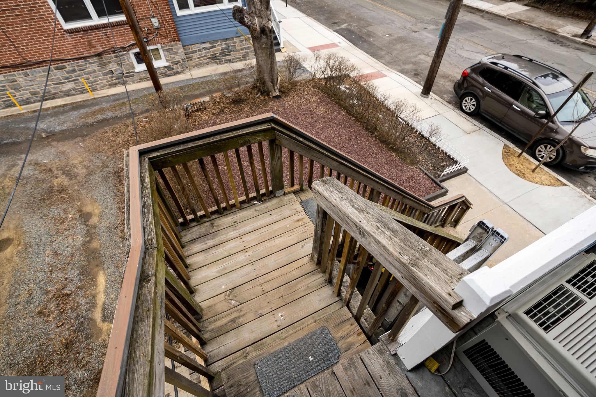 102 Ruby Street Lancaster, PA 17603 - Photo 36 of 41 a view of a balcony with wooden floor