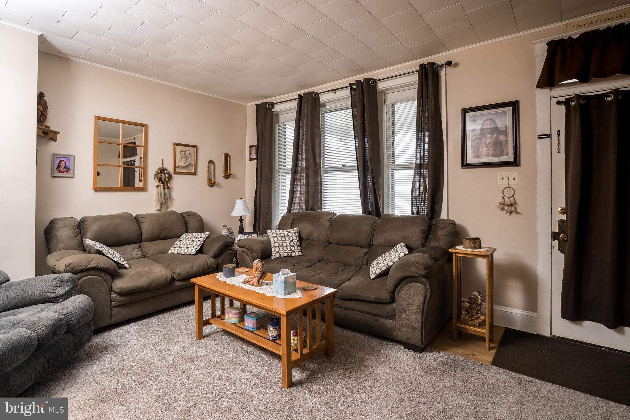 102 Ruby Street Lancaster, PA 17603 - Photo 7 of 41 a living room with furniture and a large window