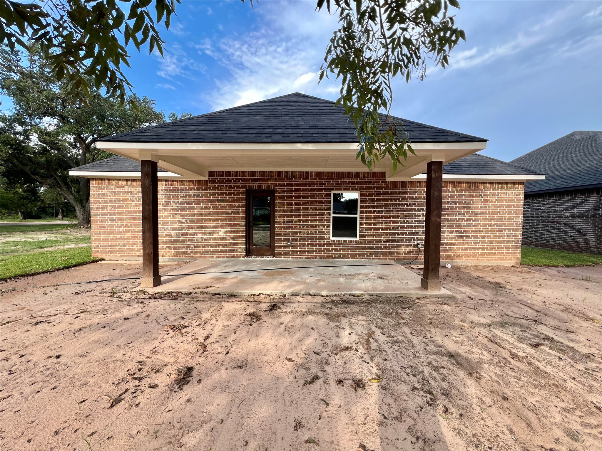 1007 South Anderson Street Angleton, TX 77515 - Photo 18 of 18 a front view of a house with a yard and garage