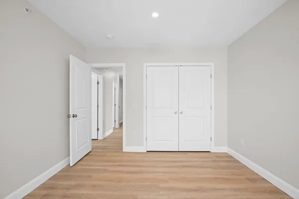 a view of a livingroom with wooden floor